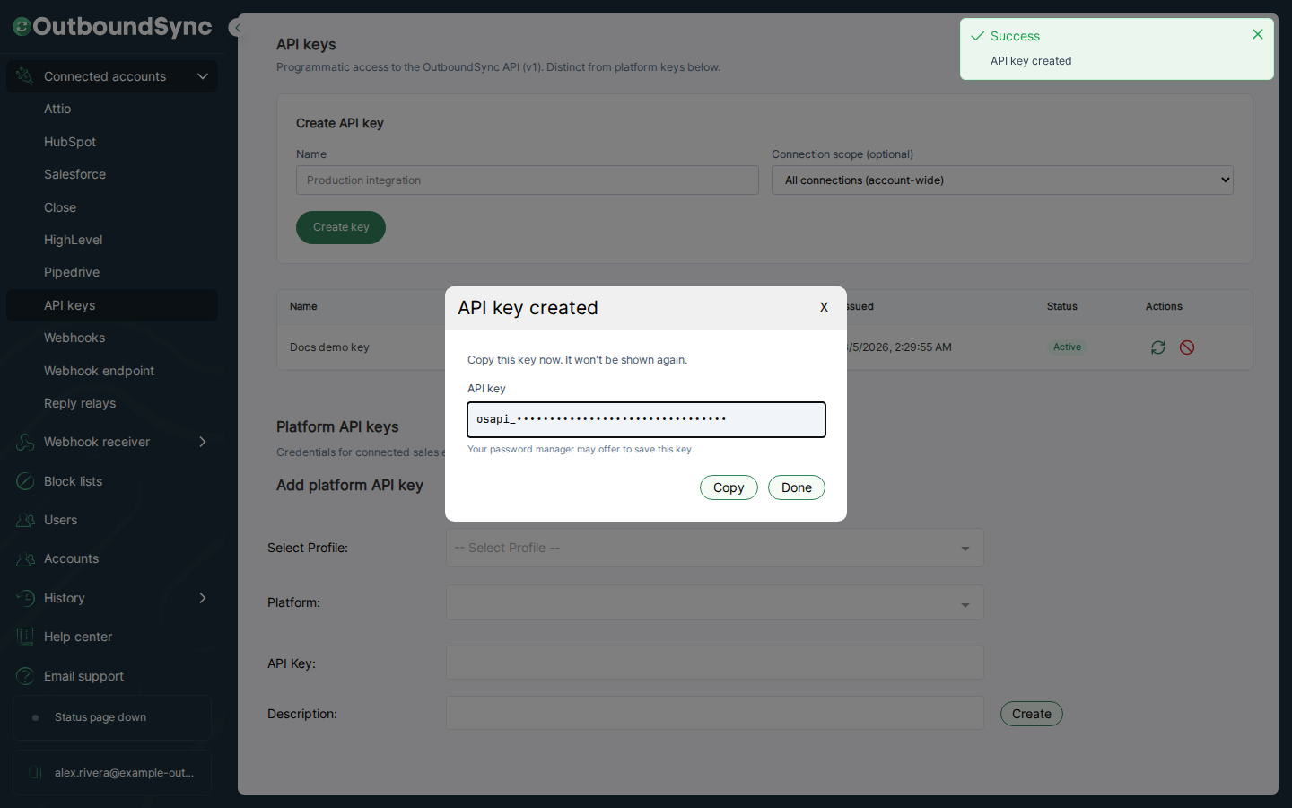 OutboundSync API key created dialog for Docs demo key showing a masked osapi_ secret, Copy button, and Done button.