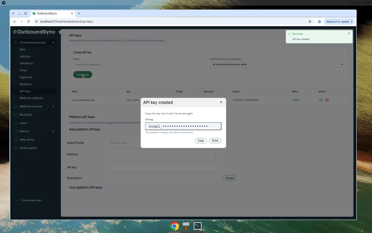 OutboundSync API key created dialog showing a masked API key field, Copy button, and Done button.