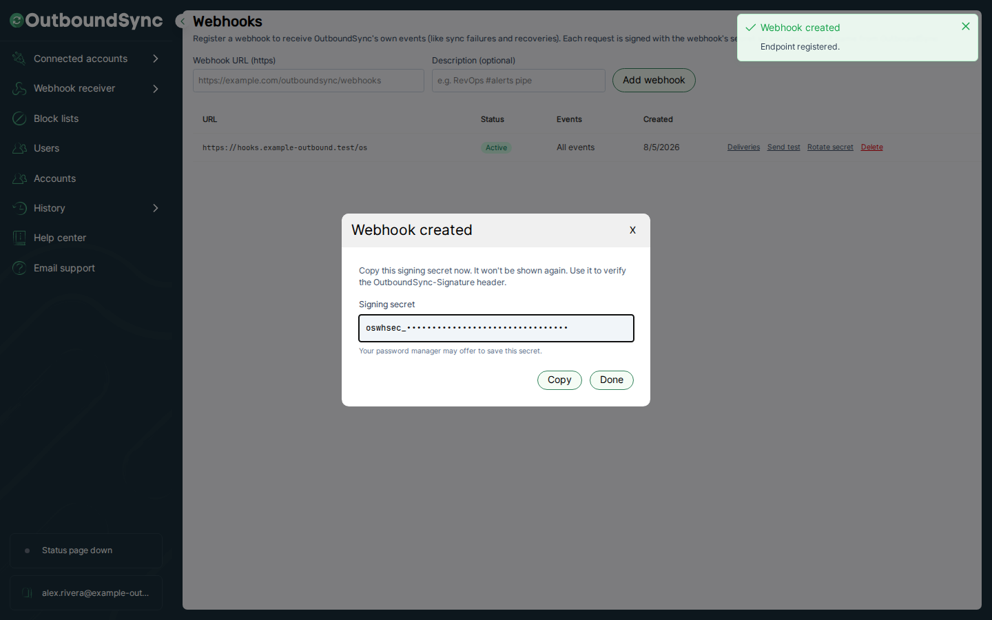 OutboundSync Webhook created dialog showing a masked signing secret that starts with oswhsec_, with Copy and Done buttons.